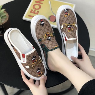 🔥Hot sale~ รองเท้าแตะครึ่งตัวหญิงฤดูร้อนสุทธิรองเท้าผ้าใบมิกกี้สีแดงนักเรียนเกาหลีรุ่นป่าใหม่ไม่มีส้นขี้เกียจ