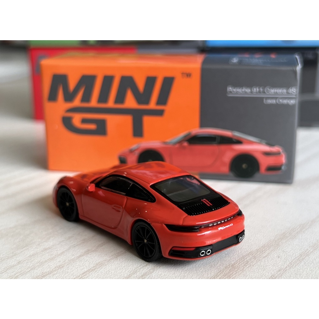 minigt-porsche-911-992-carrera-4s-lava-orange