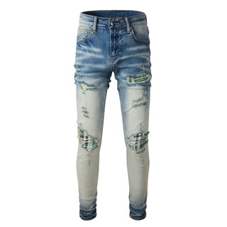 ภาพหน้าปกสินค้าAMIRI Men\'s Trendy New Patch Slim Blue Ripped Jeans ซึ่งคุณอาจชอบราคาและรีวิวของสินค้านี้