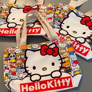 กระเป๋าสะพายไหล่ กระเป๋าช้อปปิ้ง ผ้าแคนวาส ขนาดใหญ่ จุของได้เยอะ แบบพกพา ลายการ์ตูน hello kitty Cat น้ําหนักเบา สไตล์ญี่ปุ่น