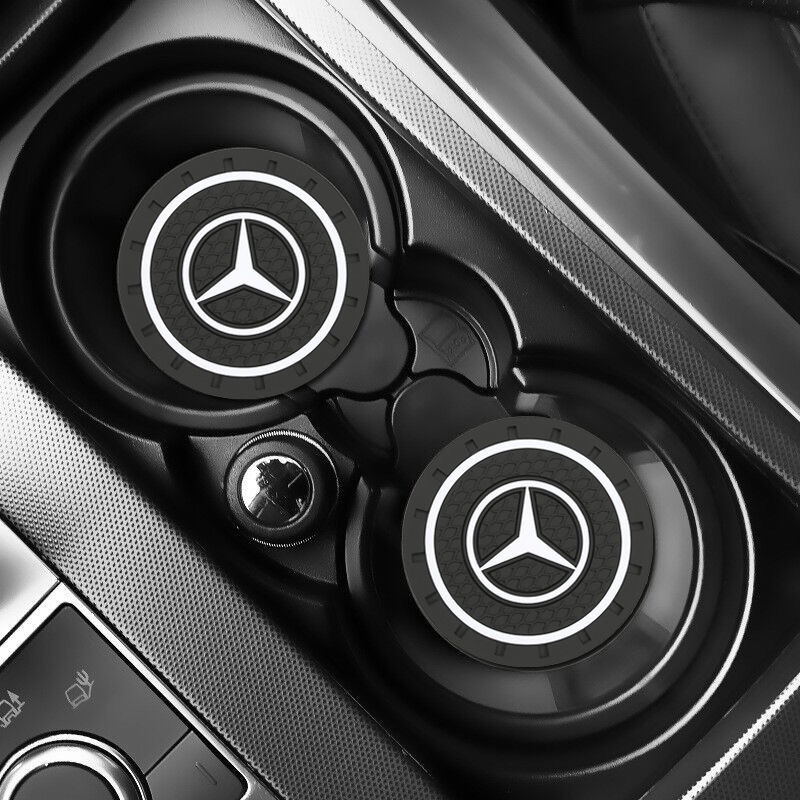 ภาพหน้าปกสินค้า2 ชิ้น ที่รองแก้วรถ ที่รองยางนุ่ม แผ่นกันลื่น benz 2pcs Car Coaster Water Cup Bottle Holder Anti-slip Pad Mat Silica Gel For Interior Decoration Car Styling Accessories For Mercedes-Benz จากร้าน guangzhoukaen8.th บน Shopee