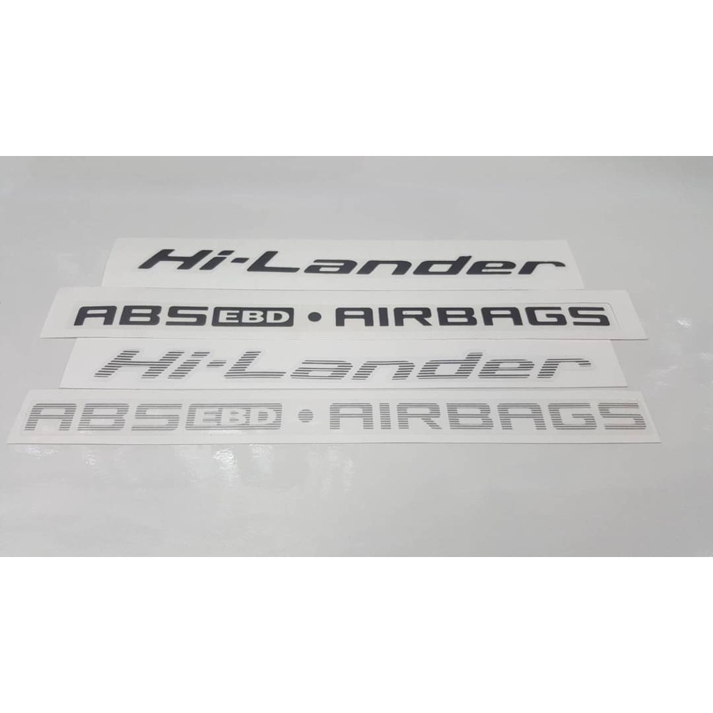 ราคาและรีวิวสติ๊กเกอร์ Hi-Lander ABS EBD AIRBAGS สำหรับติดท้ายรถ ISUZU D-MAX