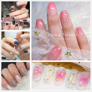 ภาพหน้าปกสินค้าYMX 3D Nail Sticker Moon Star Flower Fruit Grid Stripe Rivet Gold foil Cartoon Fashion DIY Nail Art Manicure Waterproof ที่เกี่ยวข้อง