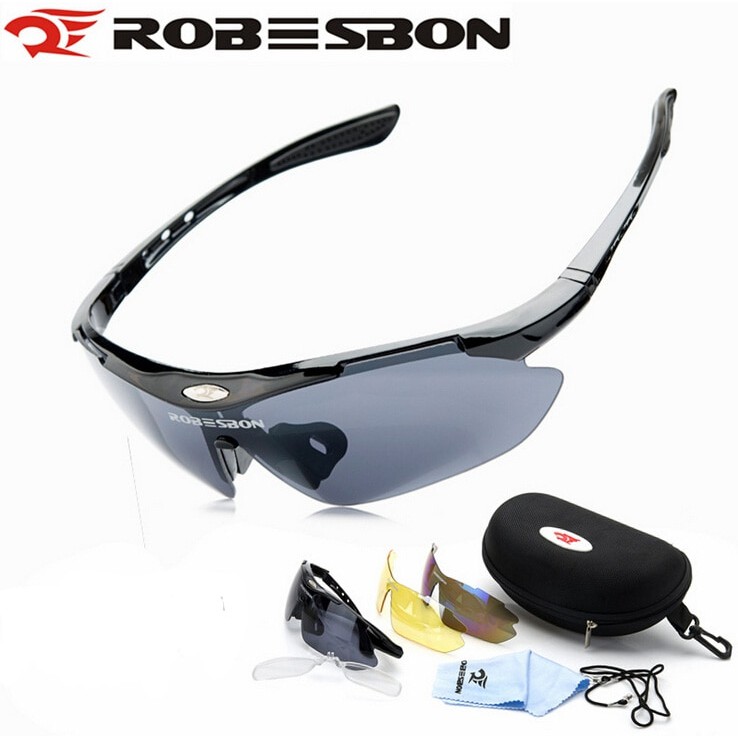 ภาพหน้าปกสินค้าROBSBON แว่นตาปั่นจักรยาน เปลี่ยนเลนส์ได้ 5 แบบ พร้อมกล่องใส่ครบชุด (สีดำ)