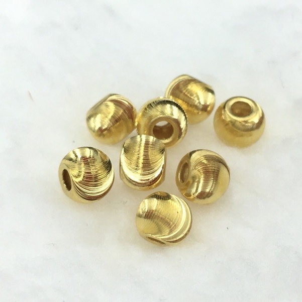 ภาพหน้าปกสินค้าพรชีวิต : ลูกปัดทอง/เม็ดทองคำแท้ "ตาแมว" 5-7 มิล ชาร์มทองคำแท้ 99.99  ฮ่องกง/มีใบรับประกัน จากร้าน pornchaiyee บน Shopee