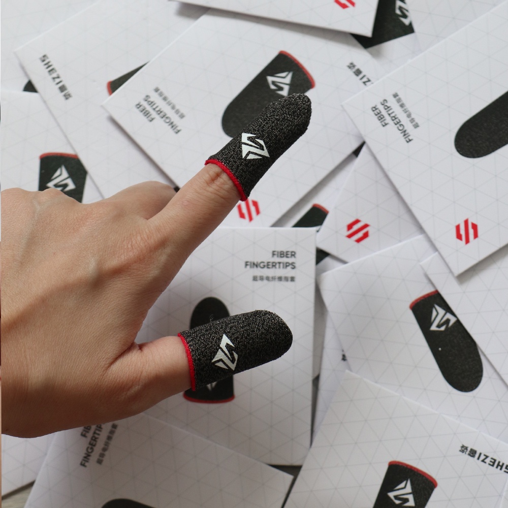ภาพหน้าปกสินค้า(แพ็ค 1 คู่) ถุงนิ้วเล่นเกม ไร้ตะเข็บ กันลื่นและป้องกันเหงื่อ ถุงนิ้วเกม Gaming Finger Sleeve สำหรับเล่น PUBG ROV COD