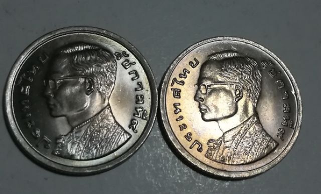 เหรียญ1บาทปี2520ภู่สั้นและภู่ยาว