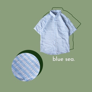 ภาพหน้าปกสินค้าเสื้อเชิ้ตแขนสั้น สีฟ้าขาว ลายทางตรง รุ่น Blue Sea ที่เกี่ยวข้อง