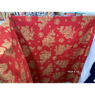 ภาพขนาดย่อของภาพหน้าปกสินค้าผ้าฝ้ายสีแดง พิมพ์ทอง ลายมังกร ลายกระต่ายมงคลตรุษจีน   Cotton 100% ️ จากร้าน mdm.and.co บน Shopee ภาพที่ 1