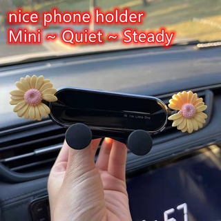 ภาพหน้าปกสินค้าที่วางโทรศัพท์ในรถยนต์ ที่วางโทรศัพท์มือถือ ลายดอกเดซี่น่ารัก แบบติดช่องแอร์ นําทาง สําหรับรถยนต์ Car phone holder. ที่เกี่ยวข้อง