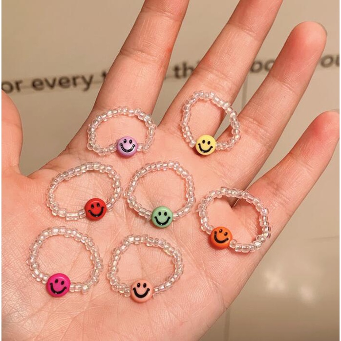 ภาพหน้าปกสินค้าCurrent Fashion Smiley Butterfly Bead Ring Trend Transparent Ring for Women Jewelry Accessories จากร้าน xuyibeauty.th บน Shopee