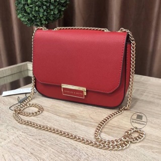 CHARLES & KEITH PUSH-LOCK CHAIN SLING BAG (outlet). สีแดง