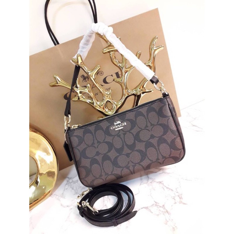 black-in-stock-best-seller-coach-top-handle-pouch-in-signature