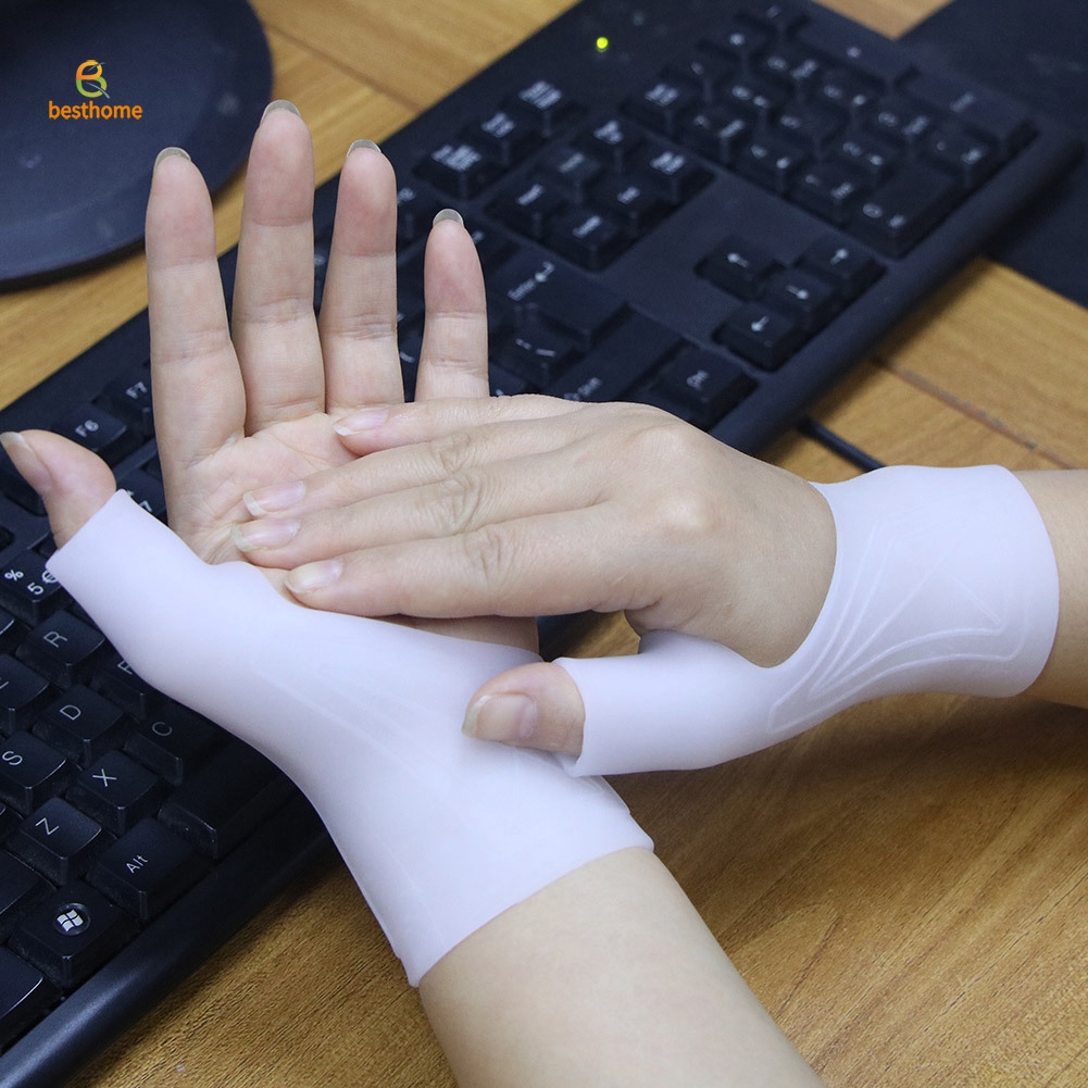 ภาพหน้าปกสินค้าBH 1pcs Silicone Gel Therapy Wrist Thumb Support Gloves Arthritis Pressure Corrector Gloves จากร้าน besthome.th บน Shopee