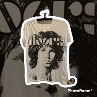 เสื้อยืดผ้าฝ้ายพิมพ์ลายขายดี Rare THE DOORS American Rock🇺🇸T-Shirt🔥🌏