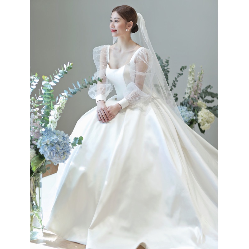ชุดแต่งงานผ้าซาตินแบบฝรั่งเศสสไตล์ใหม่เจ้าสาวแต่งงานฮันนีมูนเดินทางภาพชุดสีขาว