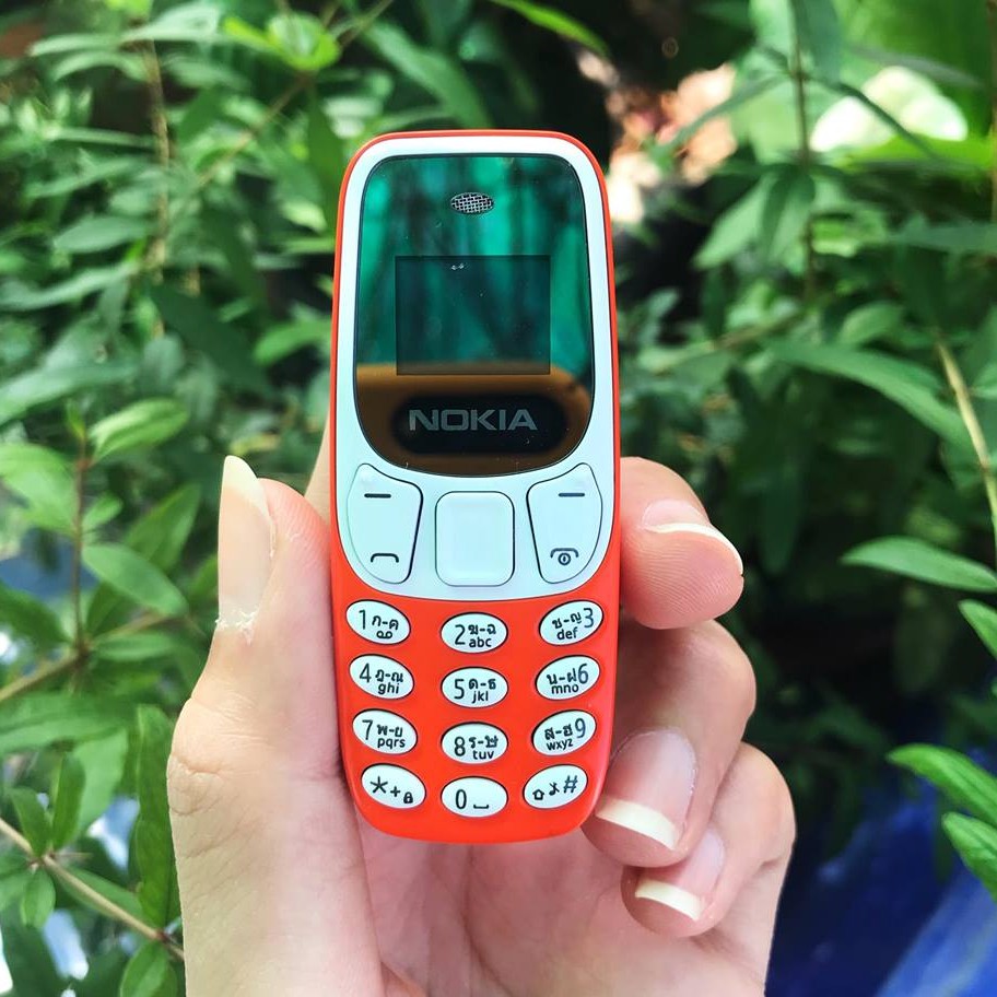 NOKIA โทรศัพท์มือถือโนเกีย จิ๋ว (สีส้ม) ใช้งานได้ 2 ซิม ปุ่มกด รุ่นใหม่