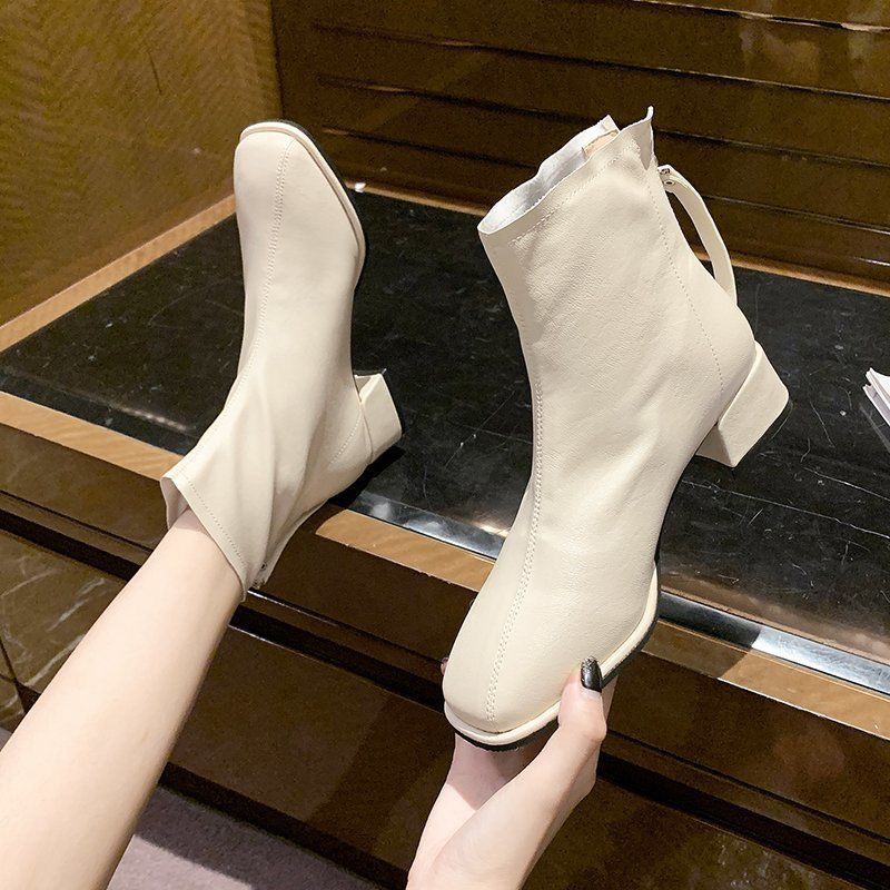 ภาพหน้าปกสินค้ามีสินค้า ไซส์ 34-43 รองเท้าผู้หญิงไซส์ใหญ่รองเท้าบูทสีขาวรองเท้าบูทสั้นรองเท้าบูทมาร์ตินระบายอากาศซิป