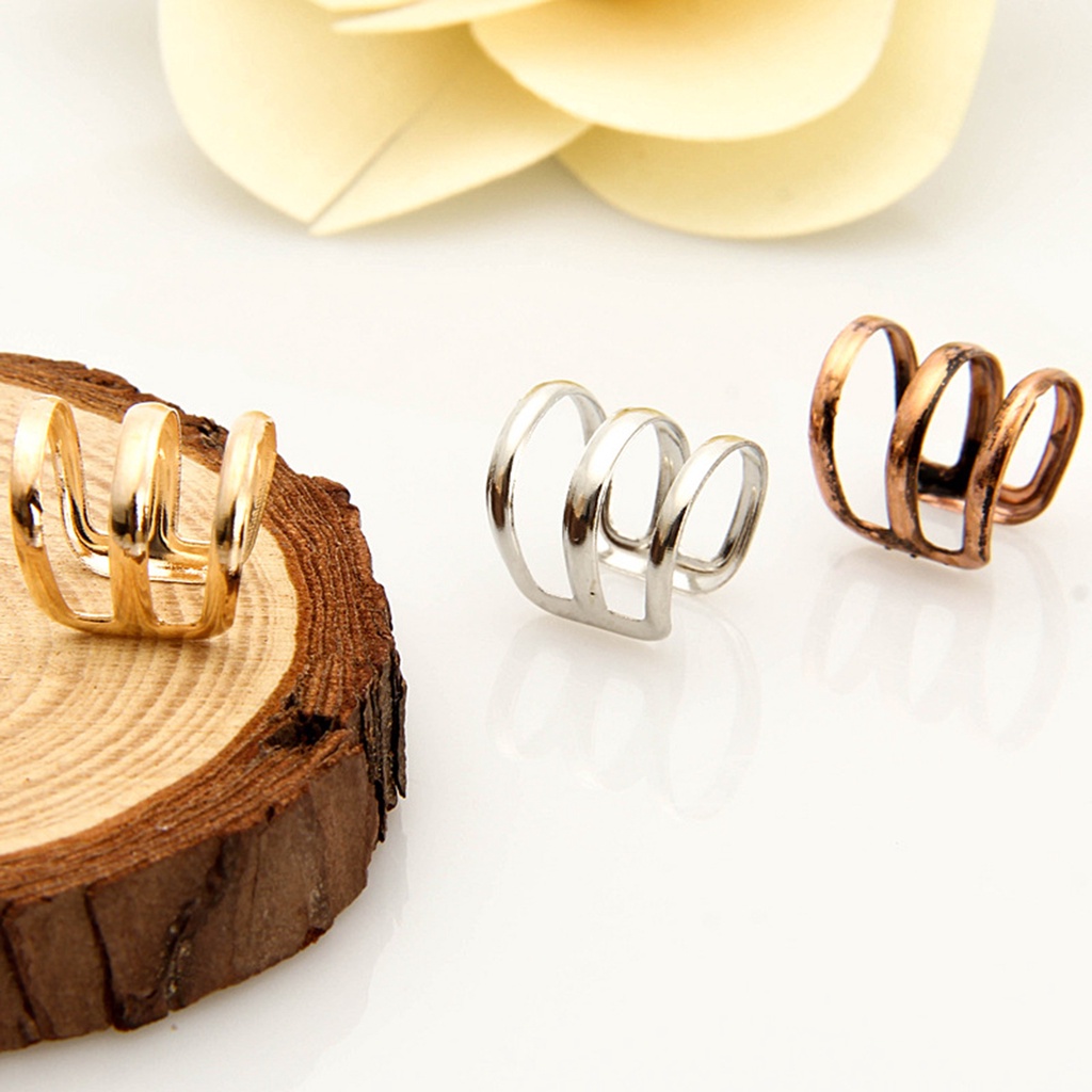 ภาพหน้าปกสินค้าFM 1Pc Ear Clip Cuff Simple Dual Use Women Adjustable 3-ring Hollow Finger Ring for Shopping Travel จากร้าน firemail.th บน Shopee