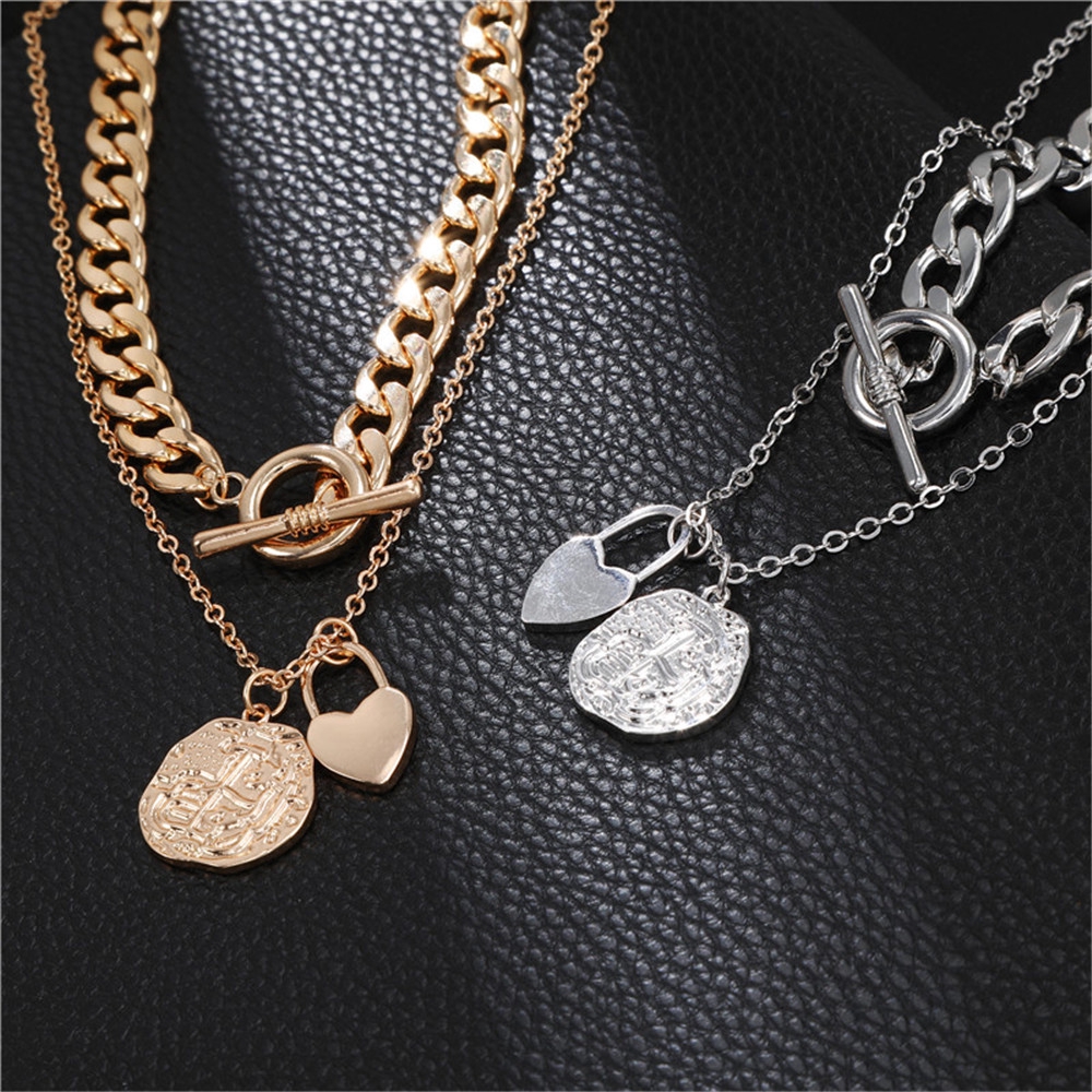 ภาพหน้าปกสินค้าNew Korea Fashion Style Chain Heart Lock Pendant Two - Layer Necklace Accessories จากร้าน tangding.th บน Shopee