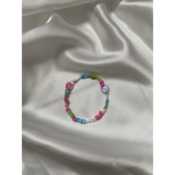 ภาพหน้าปกสินค้าpoppy trolls bracelet จากร้าน aawooodogdog บน Shopee