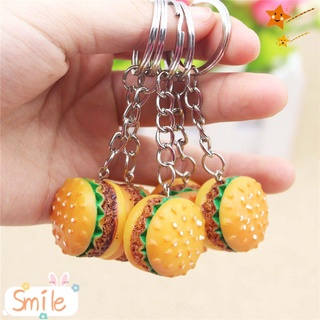 ภาพหน้าปกสินค้าSMILE New Resin Bag Pendant Mini Hamburger Key Chains Keyring Cartoon 3D Burger Funny Gift Food ที่เกี่ยวข้อง