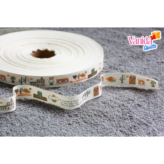 ป้ายผ้าแฮนด์เมด-ป้ายผ้าคอตตอน-diy-handmade-cotton-tape-สกรีนลายการ์ตูนสีส้มเขียว-หน้ากว้าง-2-ซม-จำนวน-1-หลา-zjj0015