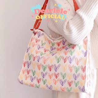 [ ทักแชทสอบถามสต๊อคก่อนกดสั่งซื้อ! ] — * Heart Heart bag 🍮 กระเป๋าผ้าพิมพ์ลายหัวใจหลากสี สายกระเป๋าสีส้ม แจกความสดใส