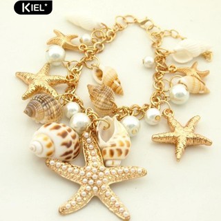 ภาพหน้าปกสินค้า‴ผู้หญิง Ocean Sea Shell ปลาดาวสร้อยข้อมือเพิร์ลอัญมณีมุกเครื่องประดับกำไลข้อมือ ซึ่งคุณอาจชอบราคาและรีวิวของสินค้านี้