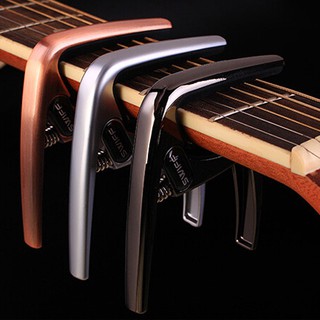 ภาพหน้าปกสินค้าCapo K8 ปรับแต่ง สำหรับกีตาร์อะคูสติก ที่เกี่ยวข้อง