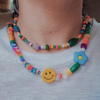 ภาพหน้าปกสินค้าสร้อยคอหน้ายิ้ม โชคเกอร์ยิ้ม ลูกปัดหน้ายิ้ม smile necklace ซึ่งคุณอาจชอบสินค้านี้