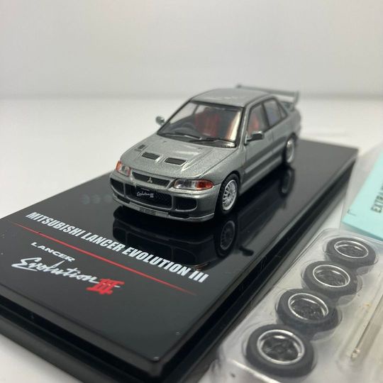 inno64-no-in64-evo3-mg-mitsubishi-lancer-evolution-3-gsr-metallic-grey-with-extra-decals-and-extra-wheels