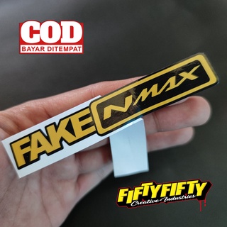 สติกเกอร์ พิมพ์ลาย FAKE NMAX กันน้ํามันวาว สําหรับติดตกแต่งหมวกกันน็อค รถจักรยานยนต์ รถยนต์