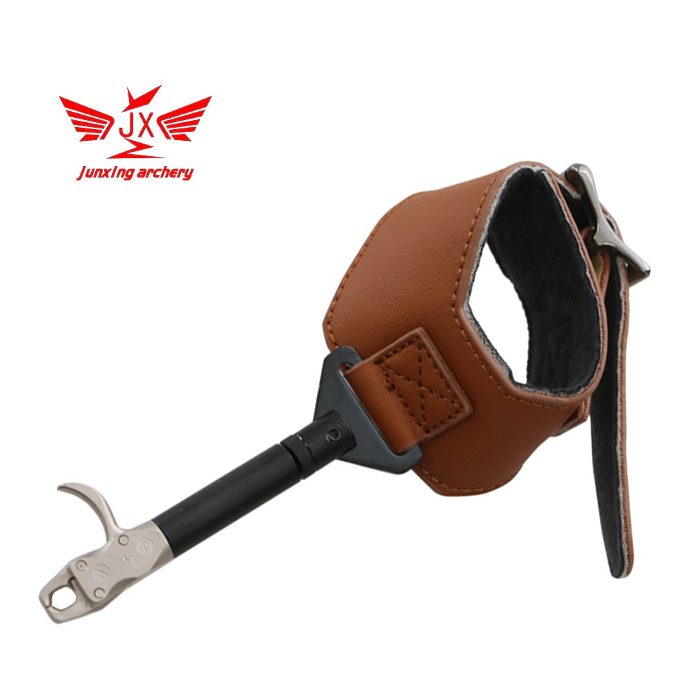 ภาพหน้าปกสินค้าJunxing Leather Archery Arrow Release Aid Bow and Arrow Shooting Accessories for Archery Bow Hunting