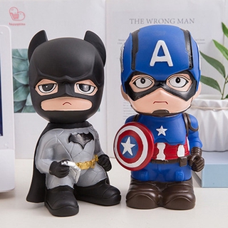 ภาพหน้าปกสินค้า【สินค้ามีจำหน่าย】 Marvel Cartoon Spiderman Batman Iron Man Captain America Action Figure Piggy Banks Coin Bank Christmas Toy HT ที่เกี่ยวข้อง