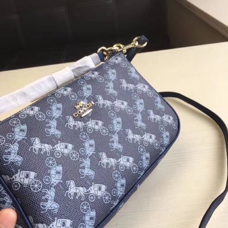 coach-top-handle-pouch-horse