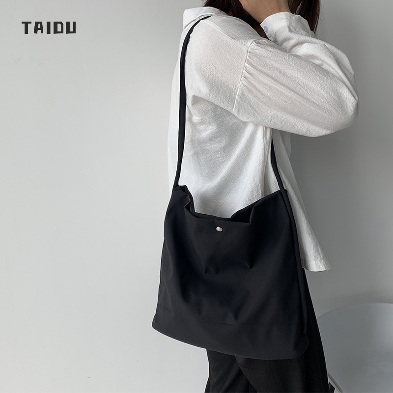 taidu-กระเป๋าไนลอน-สีลูกกวาด-เล็ก-สีทึบเรียบง่ายสด-กระเป๋าสะพายข้าง-นักเรียน-กระเป๋าทำงาน