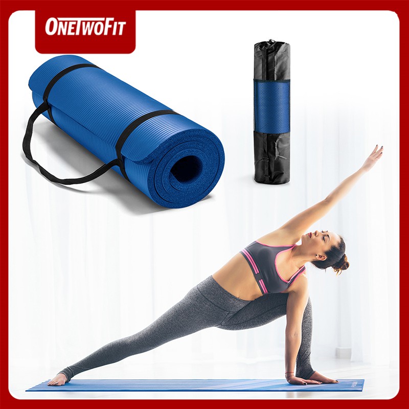 ภาพหน้าปกสินค้าOneTwoFit Yoga mat เสื่อโยคะ NBR ขนาด 183x61cm ความหนา 10mm พร้อมสายสะพาย (สีน้ำเงิน) OT050