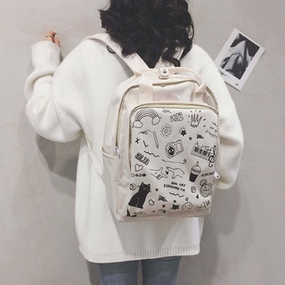 AMILA ผู้หญิงกระเป๋าเป้สะพายหลังญี่ปุ่นน่ารัก กราฟฟิตี้พิมพ์มัธยมต้นนักเรียนโรงเรียนกระเป๋านักเรียน เปิดฤดูกาล 2022 กระเป๋านักเรียนให