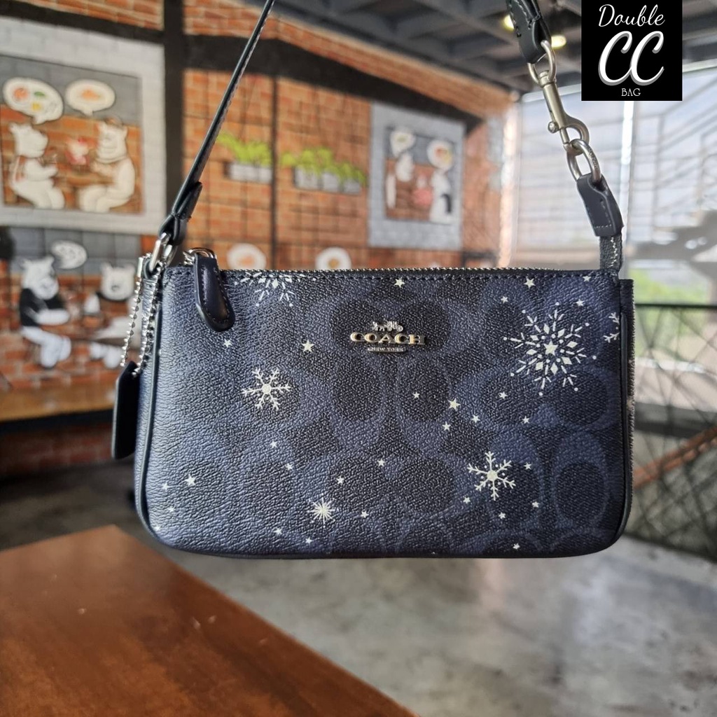 COACH C0091 NOLITA 19 IN SIGNATURE CANVAS WITH SNOWFLAKE PRINT