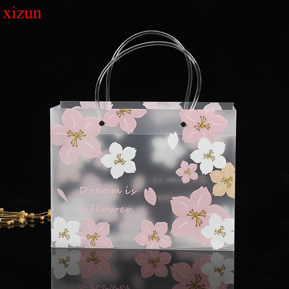 ภาพสินค้าXizun กระเป๋าถือ กระเป๋าช้อปปิ้ง Pp แบบใส กันน้ํา ลายดอกซากุระ แบบพกพา ทนต่อการสึกหรอ สําหรับใส่ของขวัญ จากร้าน xizun.th บน Shopee ภาพที่ 3