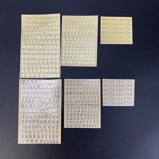 ภาพหน้าปกสินค้า[New metal sticker] Aromatherapy candle gypsum metal sticker Numbers English alphabet metal sticker ABC can be separated gold\\/silver ที่เกี่ยวข้อง