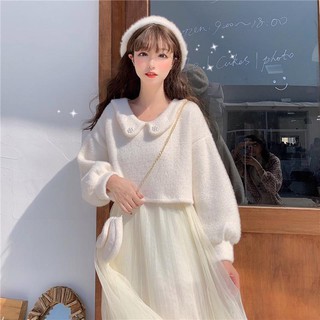 ภาพหน้าปกสินค้า🔥Hot Sale / Sweet age reduction suit Women\'s 2020 autumn and winter new mesh sling skirt mid-length cute doll sweater s ที่เกี่ยวข้อง