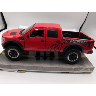 โมเดลรถยนต์ 2011 Ford F-150 SVT Raptor Pickup.  ทำจากเหล็ก สัดส่วน 1:24 ประตู ฝากระโปรง เปิดปิดได้เหมือนจริง สีแดง