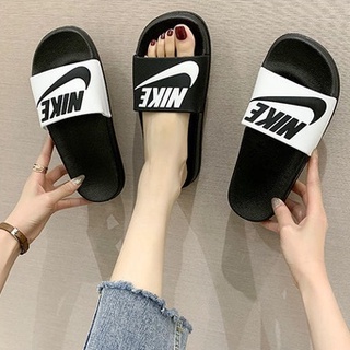 ภาพหน้าปกสินค้าNIKE !! รองเท้าแตะพร้อมส่ง รองเท้า รองเท้ากันลื่น รองเท้าใส่สบาย รองเท้าแตะชาย รองเท้าแตะผู้หญิง NIKE ที่เกี่ยวข้อง