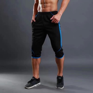 ภาพหน้าปกสินค้ากางเกงขาสั้นผู้ชายเข็มขัดยืดมีสายรัดระบายอากาศแห้งเร็วกางเกงฝึกซ้อมฟุตบอล ที่เกี่ยวข้อง