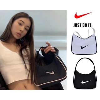 ภาพหน้าปกสินค้าสต็อกเพียงพอi! NIKE_Shoulder Bag Messenger Bag Korea Handbag IKEA Bag ซึ่งคุณอาจชอบราคาและรีวิวของสินค้านี้