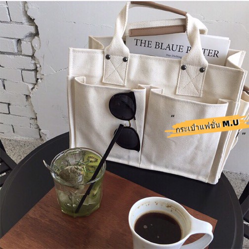 ภาพหน้าปกสินค้าพร้อมส่ง กระเป๋าแคนวาสใบใหญ่ tote bag กระเป๋าผ้า canvas มีหลายช่อง จากร้าน kshbag บน Shopee