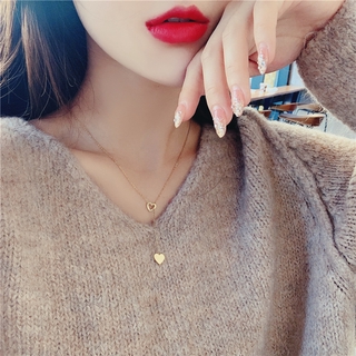 ภาพหน้าปกสินค้า๋（A11-03-18） Fashion Korean Short Double Peach Heart Tassel Necklace All-match Titanium Steel Clavicle Chain for Women ที่เกี่ยวข้อง