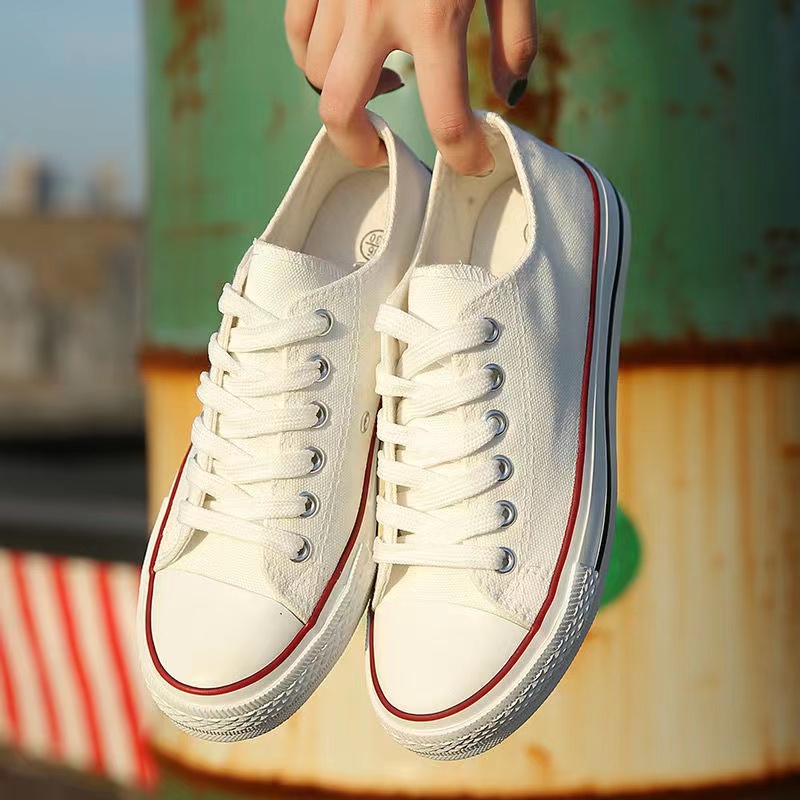 ภาพหน้าปกสินค้าจัดส่งฟรีต่ำสุดพร้อมส่งรองเท้าผ้าใบสีขาว สำหรับผู้หญิงรองเท้าแฟชั่นสไตล์เกา/รองเท้าผ้าใบ จากร้าน sagittarius.shoes บน Shopee